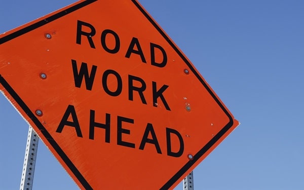 Orange Road Work Ahead Sign